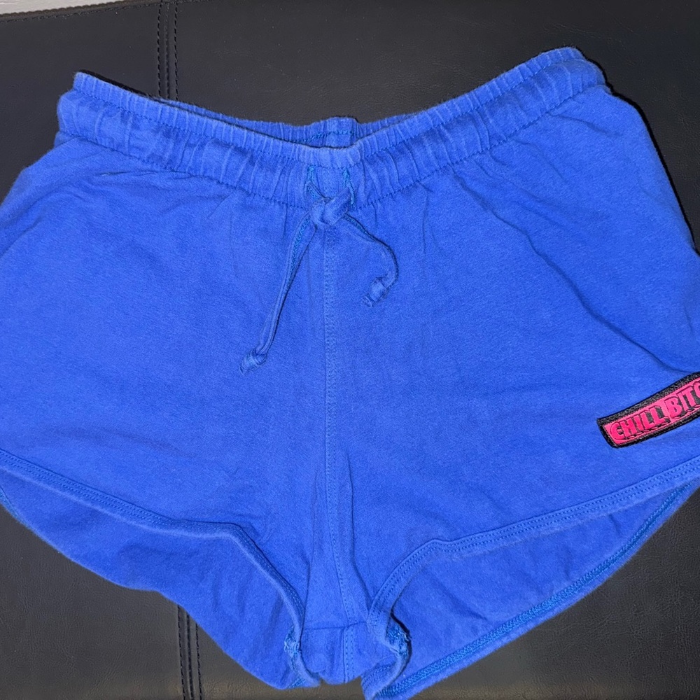 Blue Athletic Shorts with Elastic Waistband and Curved Hems